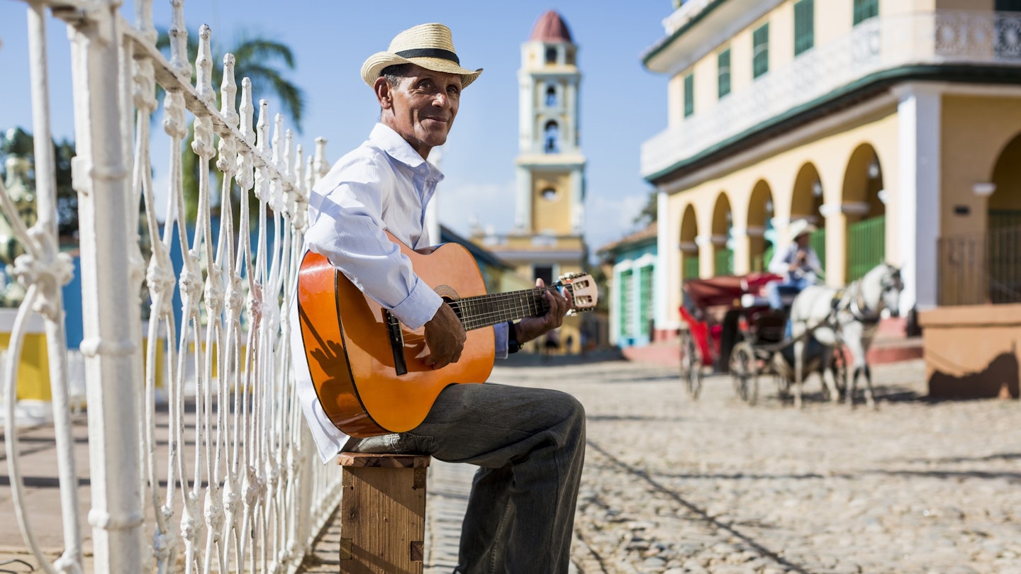 717168005
Musician in Trinidad, Cuba
guitarist, street musician, music, musician, Trinidad, playing, guitar, men, Central America, Caribbean, Cuba, musical instrument, stringed instrument, people, Adults, mature men, 55-59 years, square, skill, full length, Arts Culture and Entertainment, day, hat, Travel, casual clothing, shirt, outdoor, Native, sitting, authentic, Travel destination, Old Town, clear sky, one person, sky, sunlight, stool, Incidental People, confidence, relaxed, smiling, Joy, real people, content, building, tourism, carriage, making music, man, mature adults, 50 Plus Years, 50-60 years, city, sunshine, built structure, vehicle, horse cab, Photography, Color Image