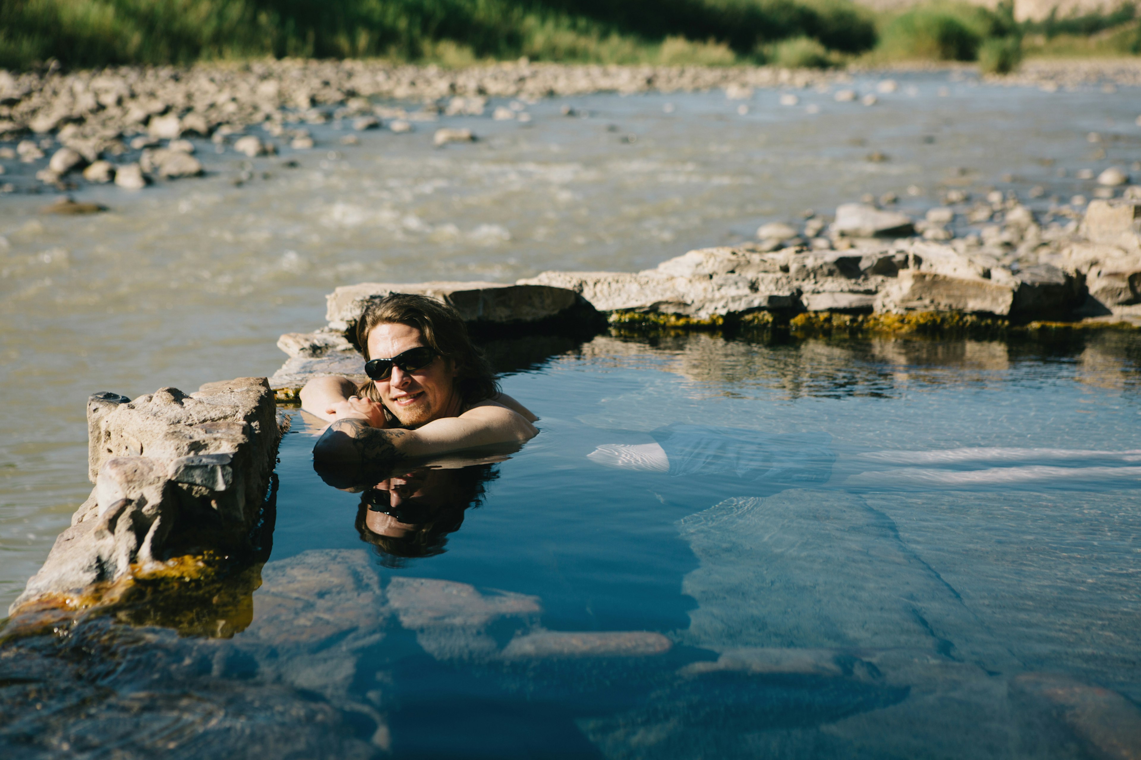 A woman swims in a hot spring in Big Bend National Park, Texas