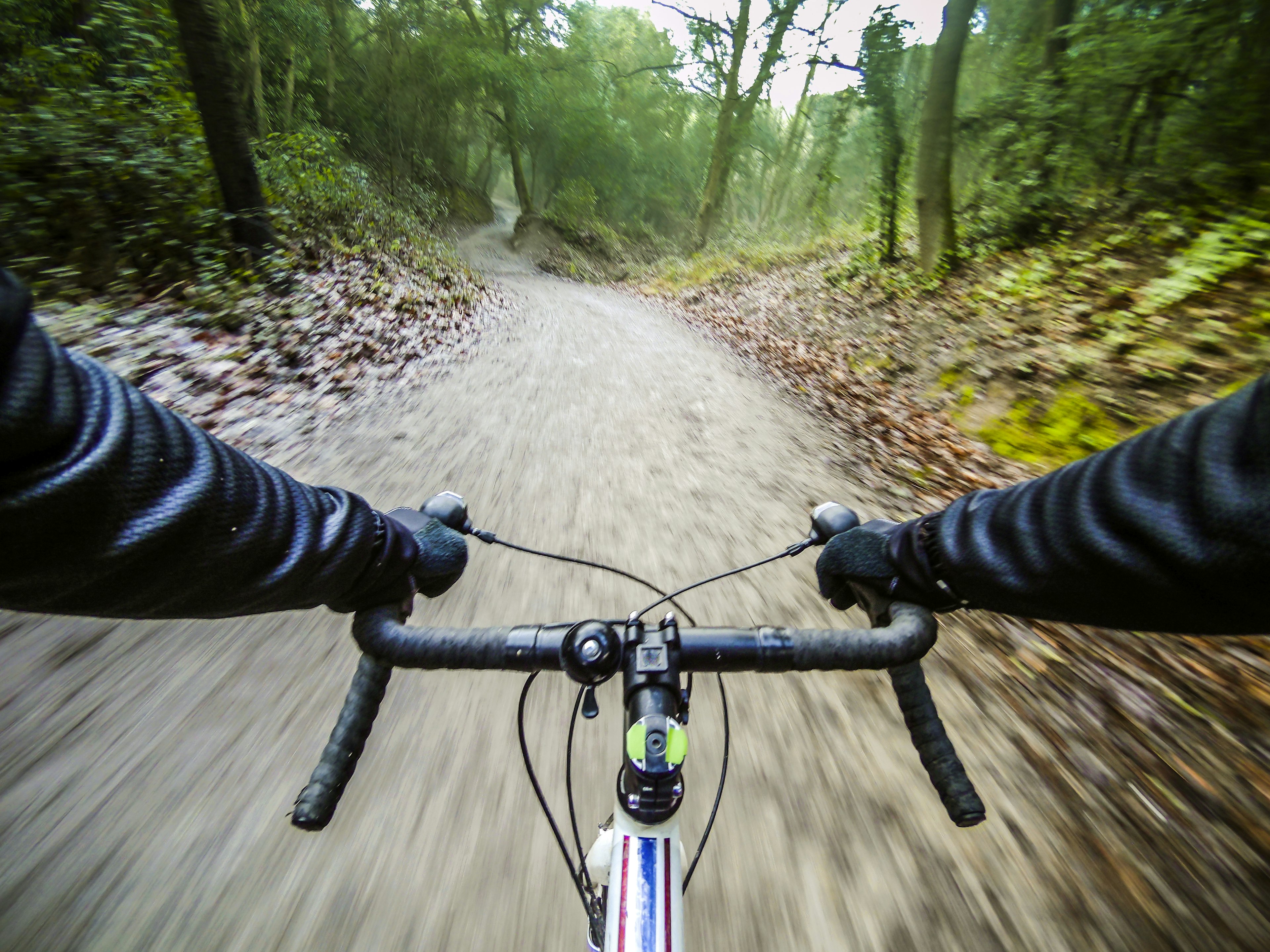 An onboard camera captures the moment when a cyclist rides through the forests of Collserola, a natural park near the city of Barcelona.