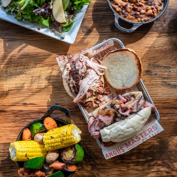 Barbecue food and vegetables on a table