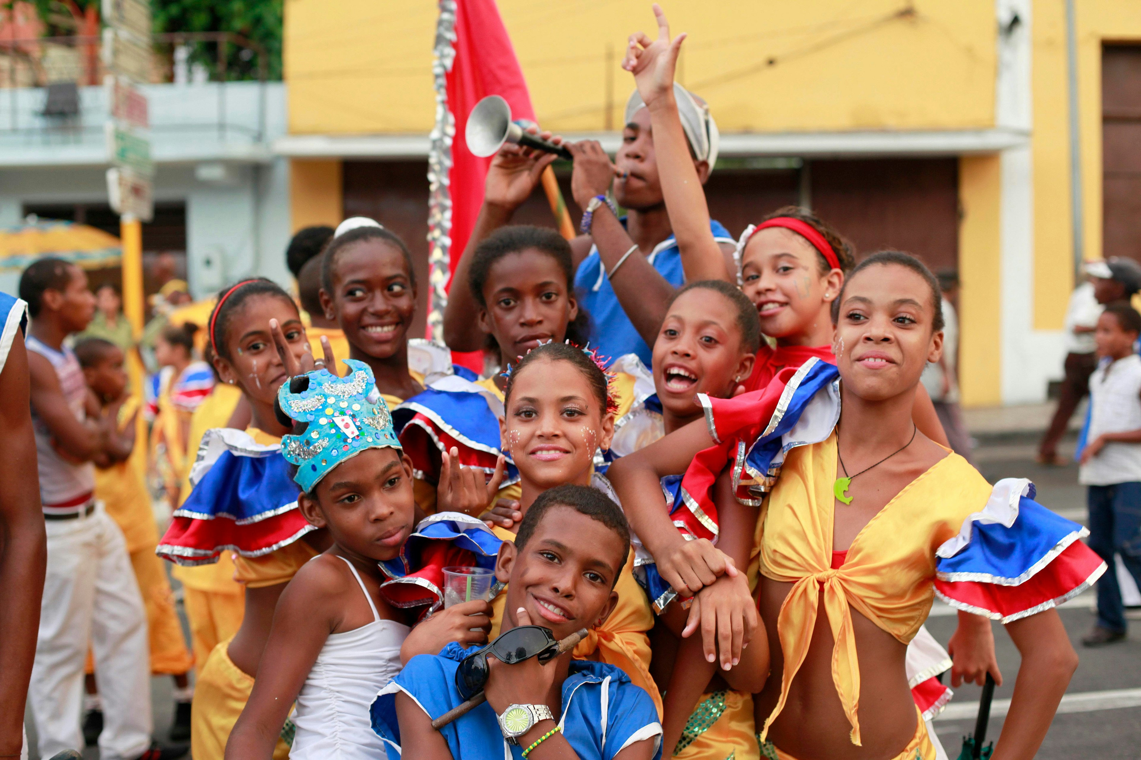 Children in colorful costumes at Carnival in Santiago de Cuba, Cuba