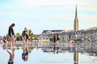 BORDEAUX, FRANCE - 3 september, 2016 : Bordeaux water mirror full of people in one of the hotest summer day, having fun in the water, the pool is the largest water mirror in the world with 3450 sq.m.; Shutterstock ID 478176790; purchase_order: 65050; job: ; client: ; other: Bordeaux best time to visit
478176790