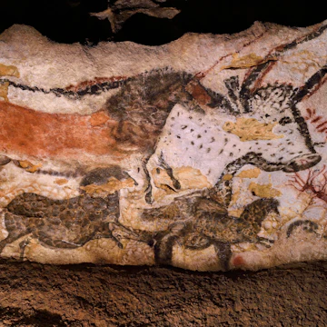 Reconstruction of cave paintings of animals inside Lascaux II.