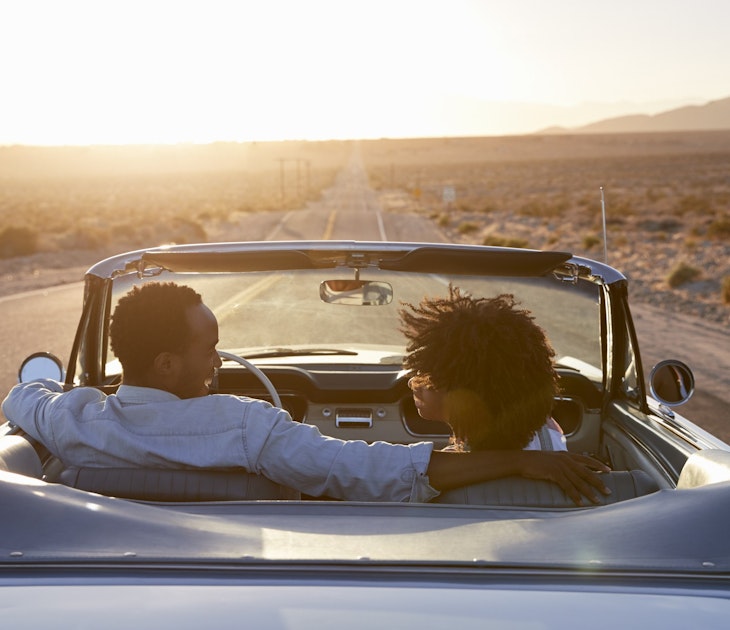 Rear View Of Couple On Road Trip Driving Classic Convertible Car Towards Sunset
1030408008
couple, holiday, vacation, lifestyle, countryside, woman, female, man, male, together, person, african american, black, 20s, twenties, classic car, wanderlust, open top, view from behind, romantic, flare, open road, car, journey, road trip, summer, fun, enjoyment, freedom, escape, adventure, carefree, driving, road, highway, desert, women, men, two people, people, horizontal, california, usa, convertible, rear view, sitting, romance, sunset, lens flare