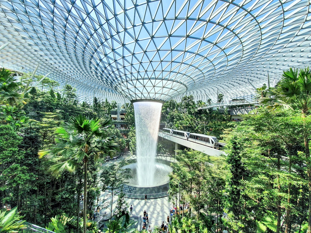 Rain vortex, the world’s tallest indoor waterfall at Jewel Changi Airport (Singapore) - stock photo
The Rain Vortex is an indoor waterfall in Jewel Changi Airport, Singapore, which was opened in April 2019. It is the world's largest indoor waterfall at 40 metres (130 ft) in height and surrounded by a four-storey terraced forest.
© Frans Sellies / Getty