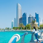 Female tourist visiting Abu Dhabi downtown corniche area and enjoying the view in the United Arab Emirates capital city
1248912615