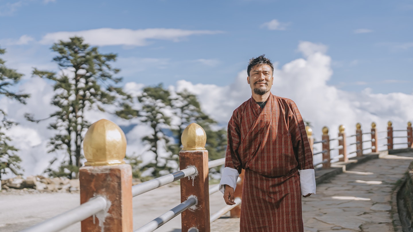 Portrait of Bhutanese man in traditional clothing at Dochula Pass
1434727198
