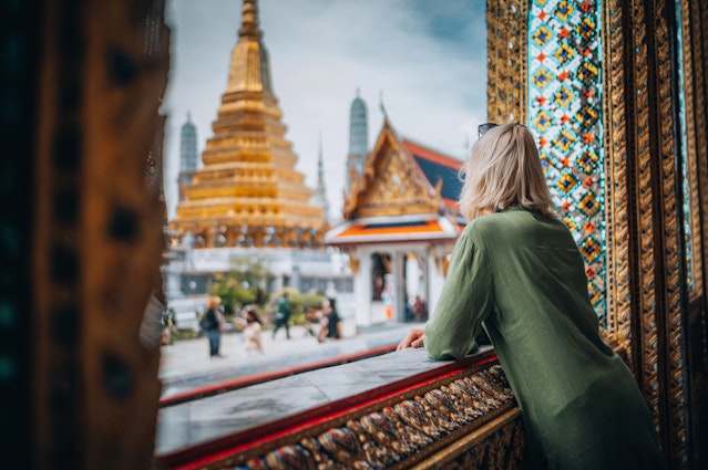 Young woman exploring Grand Palace and Wat Phra Kaew in Bangkok, Thailand
1449522453
