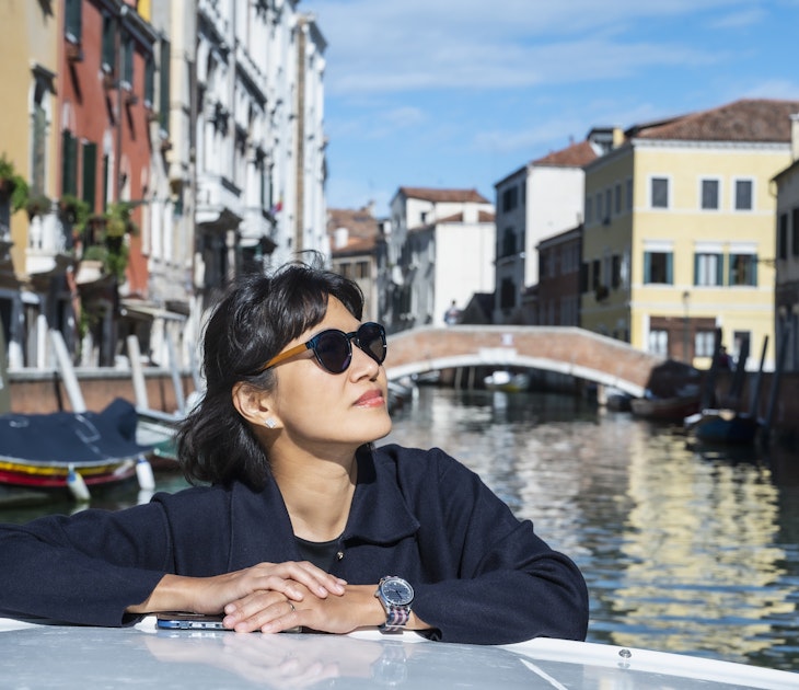 1461190044
40-49 years old, asian, asian ethnicity, boat, bridge, colour image, female, fourties, historic site, residential housing, sightseeing, travel destination, urban, venice, waterway, waterways