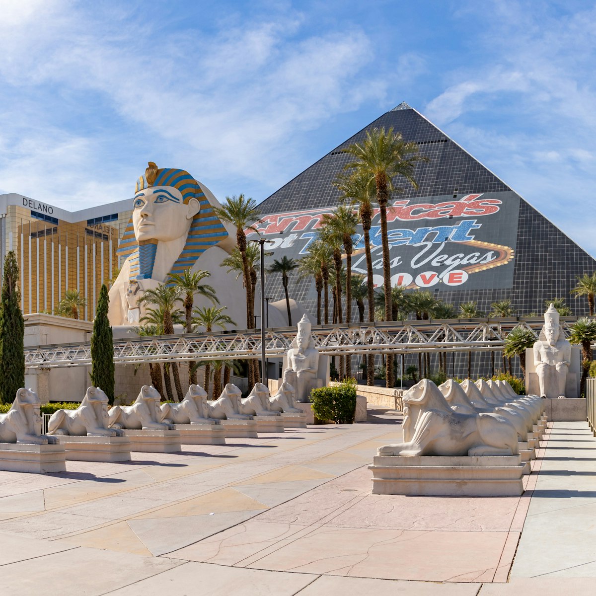 Las Vegas, United States - November 23, 2022: A picture of the Luxor Hotel and Casino.
1482858774
america, betting, building, casinos, delano, egyptian, entertainment, hotels, luxor, palm trees, pavement, rail, sculptures, show, sin city, statues, trees, united states, united states of america, vegas