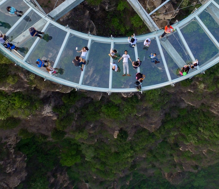 This photo taken on April 30, 2016 shows a glass sightseeing platform in Shilinxia scenic spot in Pinggu District of Beijing. .The sightseeing platform, which hangs 32.8 meters out from the cliff, is claimed to be the largest glass sightseeing platform in the world. / AFP / STR / China OUT        (Photo credit should read STR/AFP via Getty Images)
528407070
Horizontal