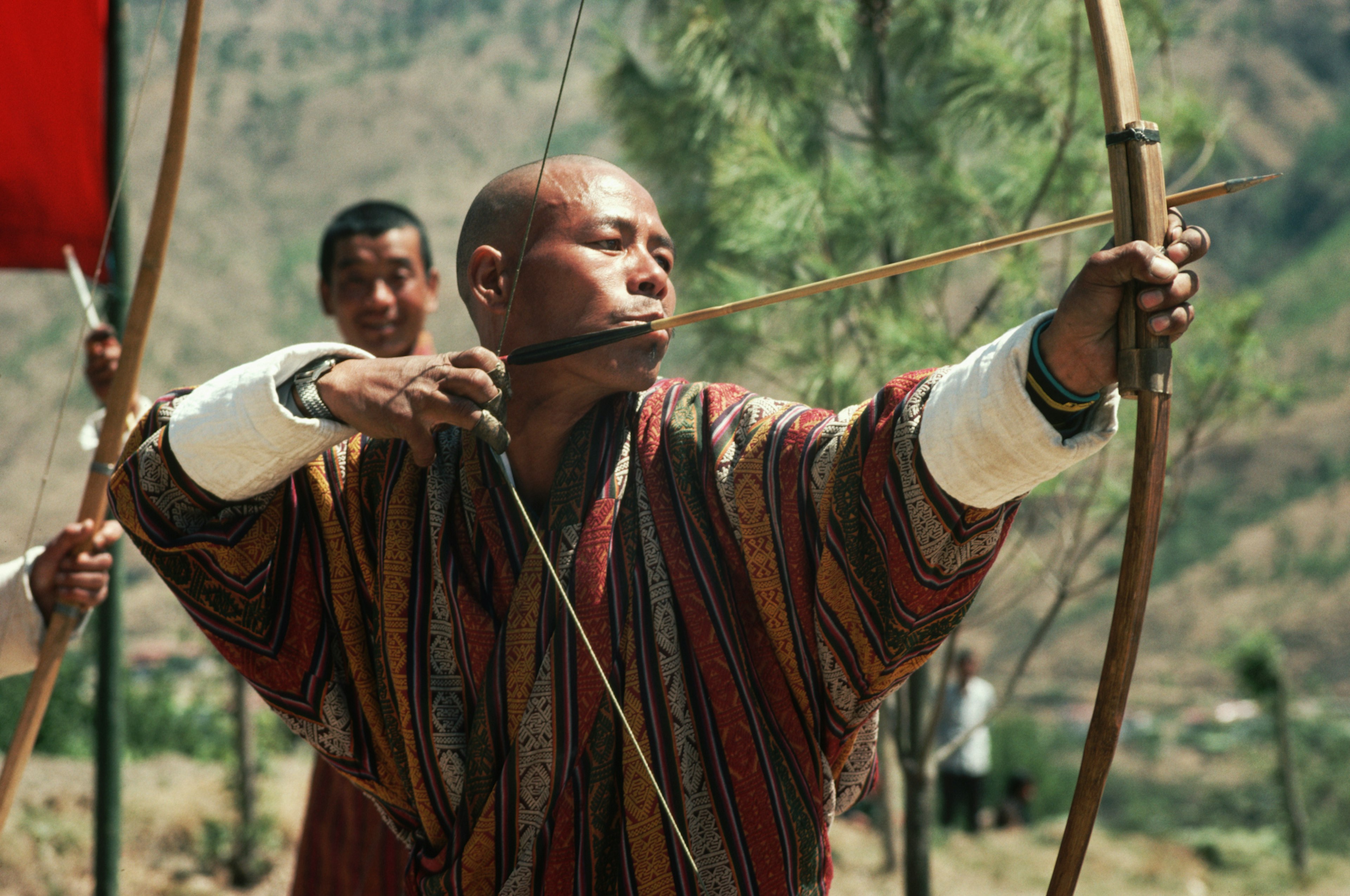 An archer wears traditional Bhutanese clothes to participate in a contest at Thimphu