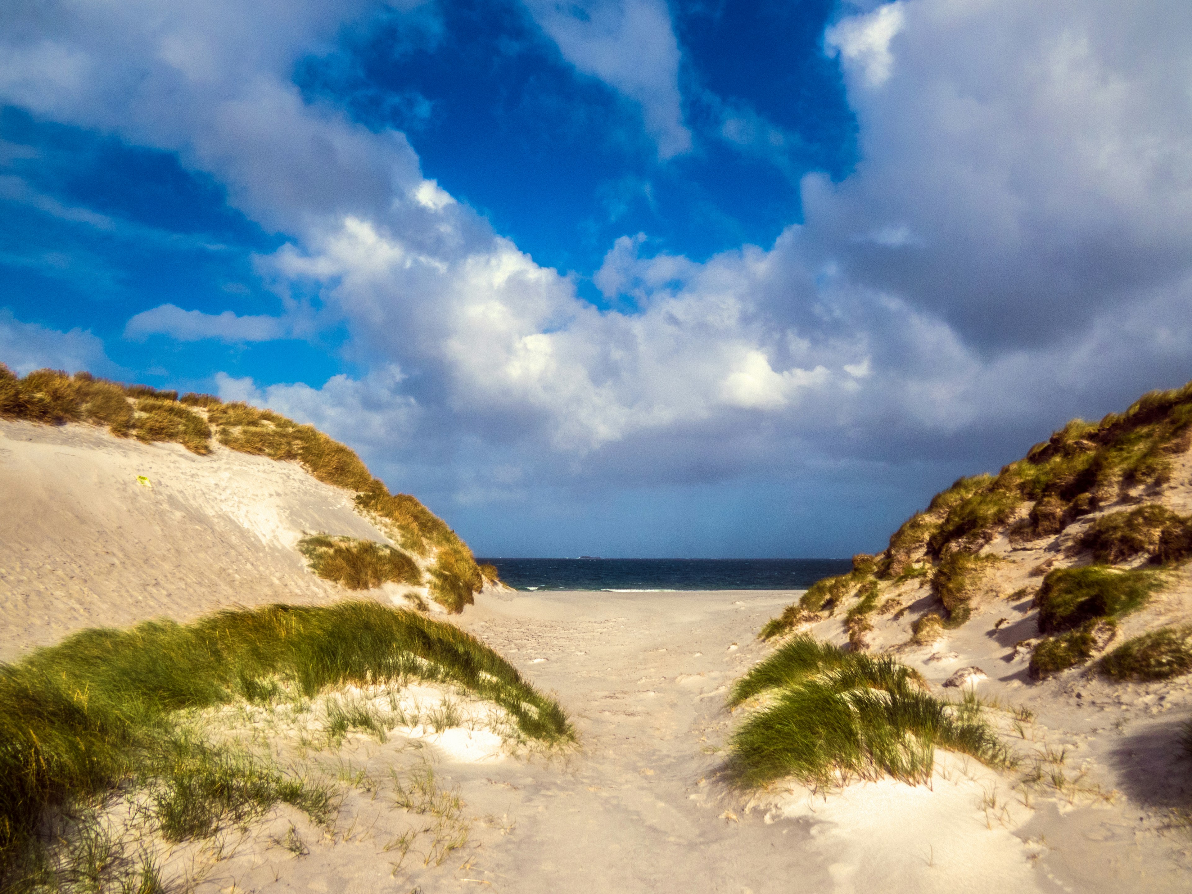 West Beach is a vast expanse of superfine machair; white shell sand, on the island of Berneray, a small island linked to North Uist by a built causeway. The Western Isles are famous for their beautiful Atlantic beaches.