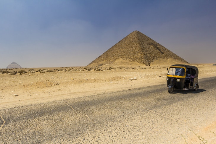 A Tuc Tuc on the road in the desert, close to Sakkara Pyramids.
579960259