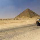 A Tuc Tuc on the road in the desert, close to Sakkara Pyramids.
579960259