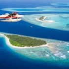 Sea plane flying above Maldives islands, concept of travel and vacation
642772028