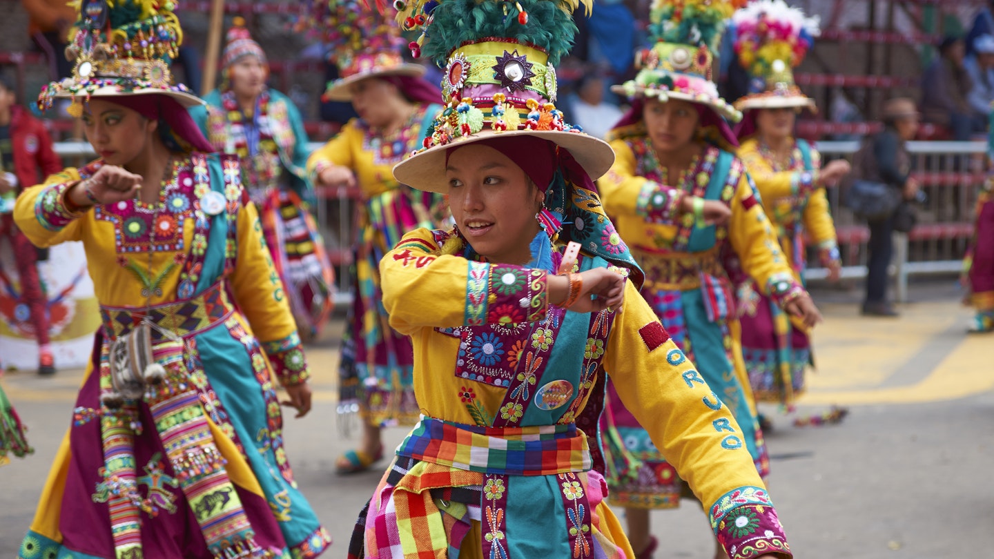 Oruro, Bolivia - February 26, 2017: Tinkus dancers from the group Los Tolkas, performing in Av 6 de Agosto, at the annual Oruro Carnival in Bolivia. The event has been classified by UNESCO as being of Intangible Cultural Heritage of Humanity and attracts around 30,000 dancers and musicians.
682786686
action, america, beautiful, bolivian, carnival, colour, colourful, cultural, culture, dance, ethnic, fabric, face, famous, festival, fiesta, green, group, happy, moving, oruro, procession, tinkus, urban, woman