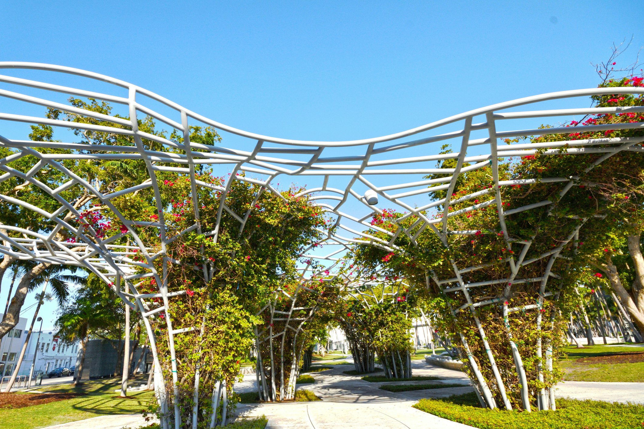 Miami Florida USA - April 11 2018:  People Enjoying the Trellis Landscape of Soundscape Park Miami
959772234
arch, arches, center, enjoying, florida, garden, green, palm, park, path, peaceful, public, relaxing, soundscape, spring, tourists, trees, urban, view