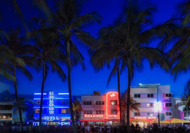 Illuminated hotels on Ocean Drive at South Beach, Miami Beach, Florida, USA
