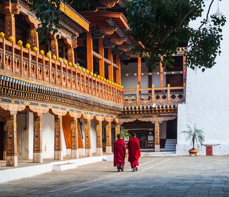 Two buddhist monks at Punakha Dzong, Bhutan