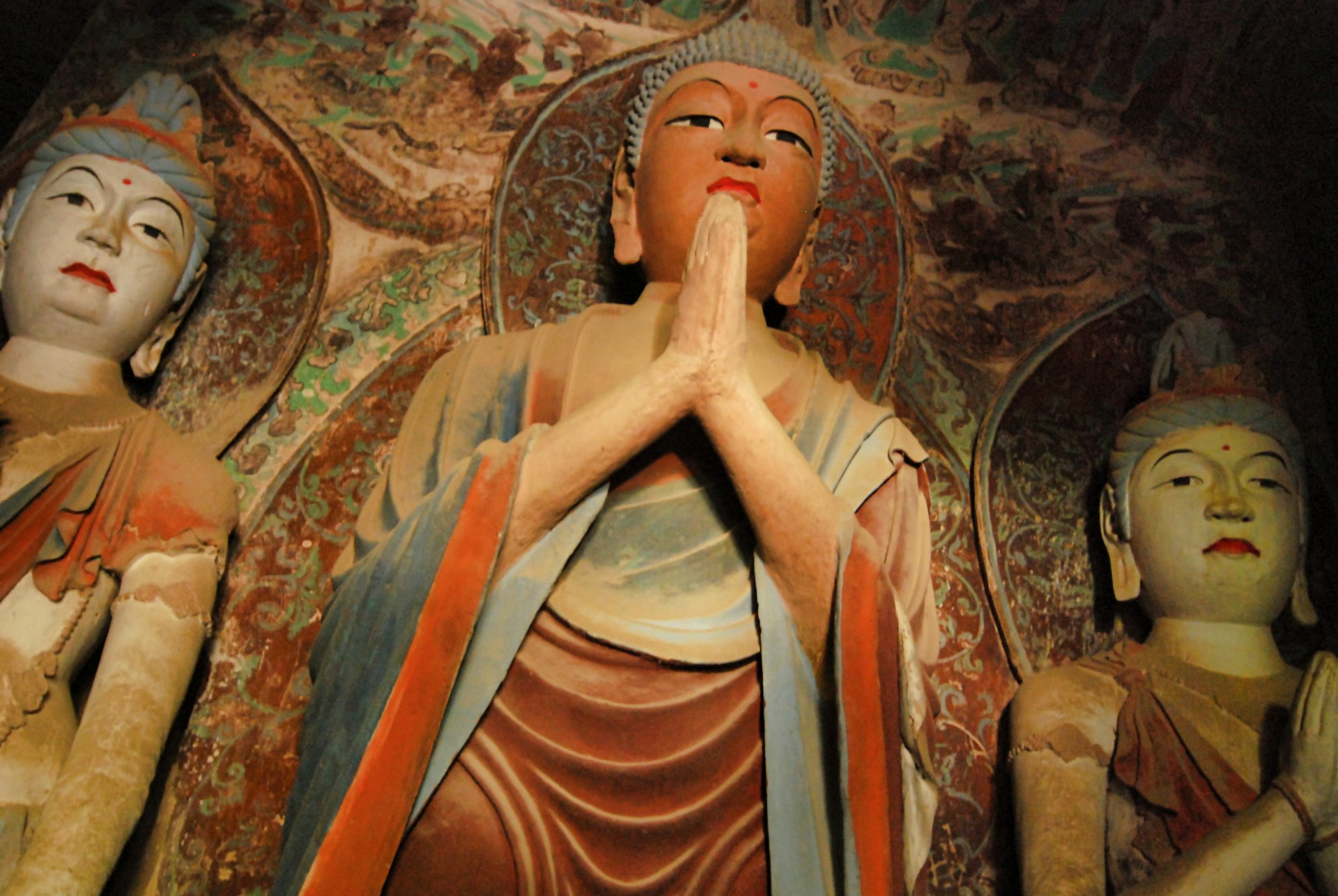 Buddha scultpures in the Mogao Caves, Dunhuang, China