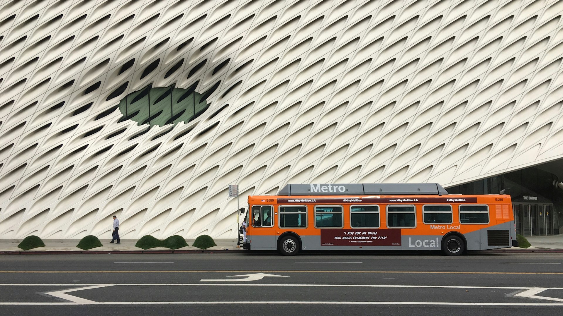 An LA Metro bus in front of The Broad Museum, Downtown, Los Angeles, California, USA