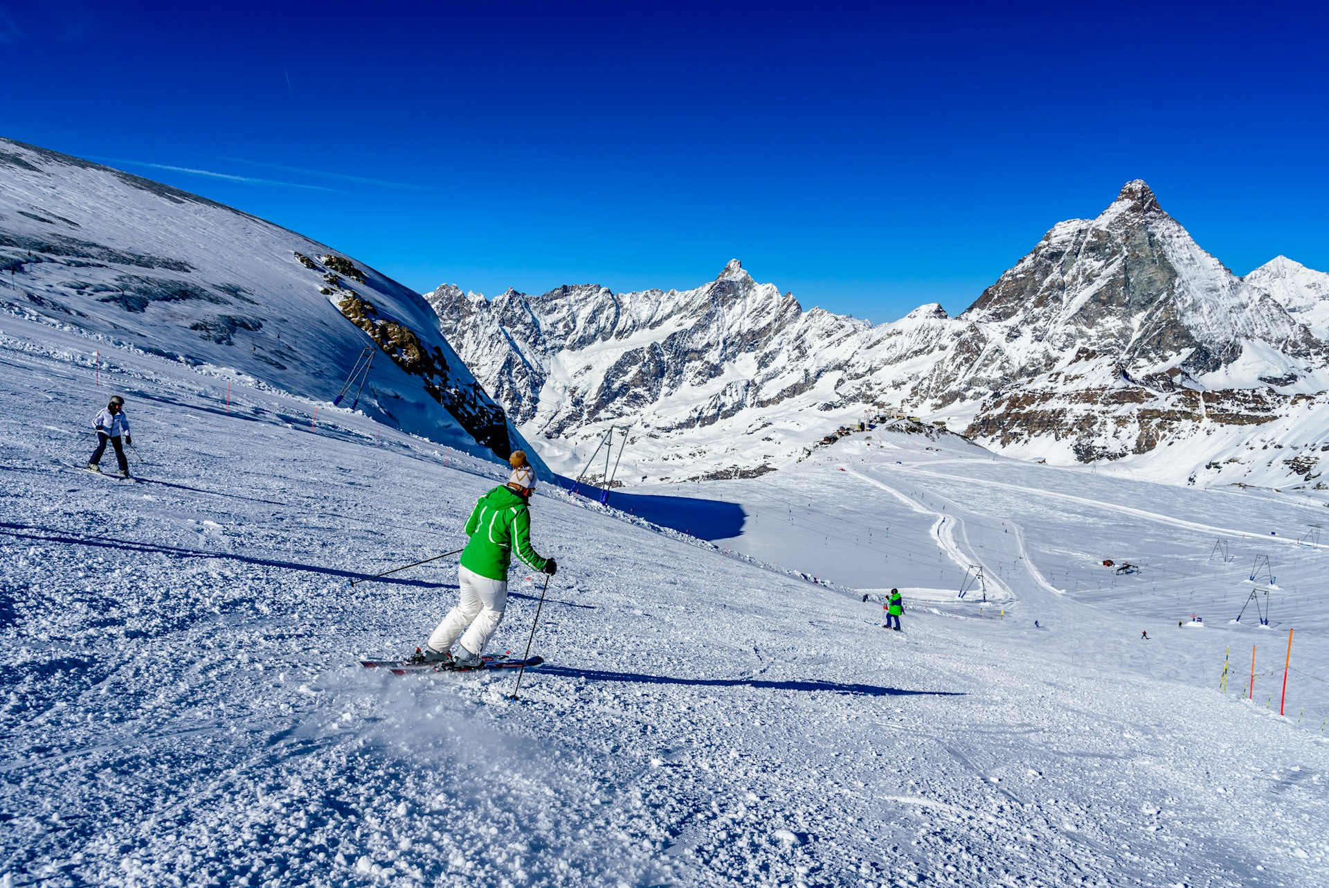 A skier on a trail at a resort in Breuil-Cervinia, Italy, Alps