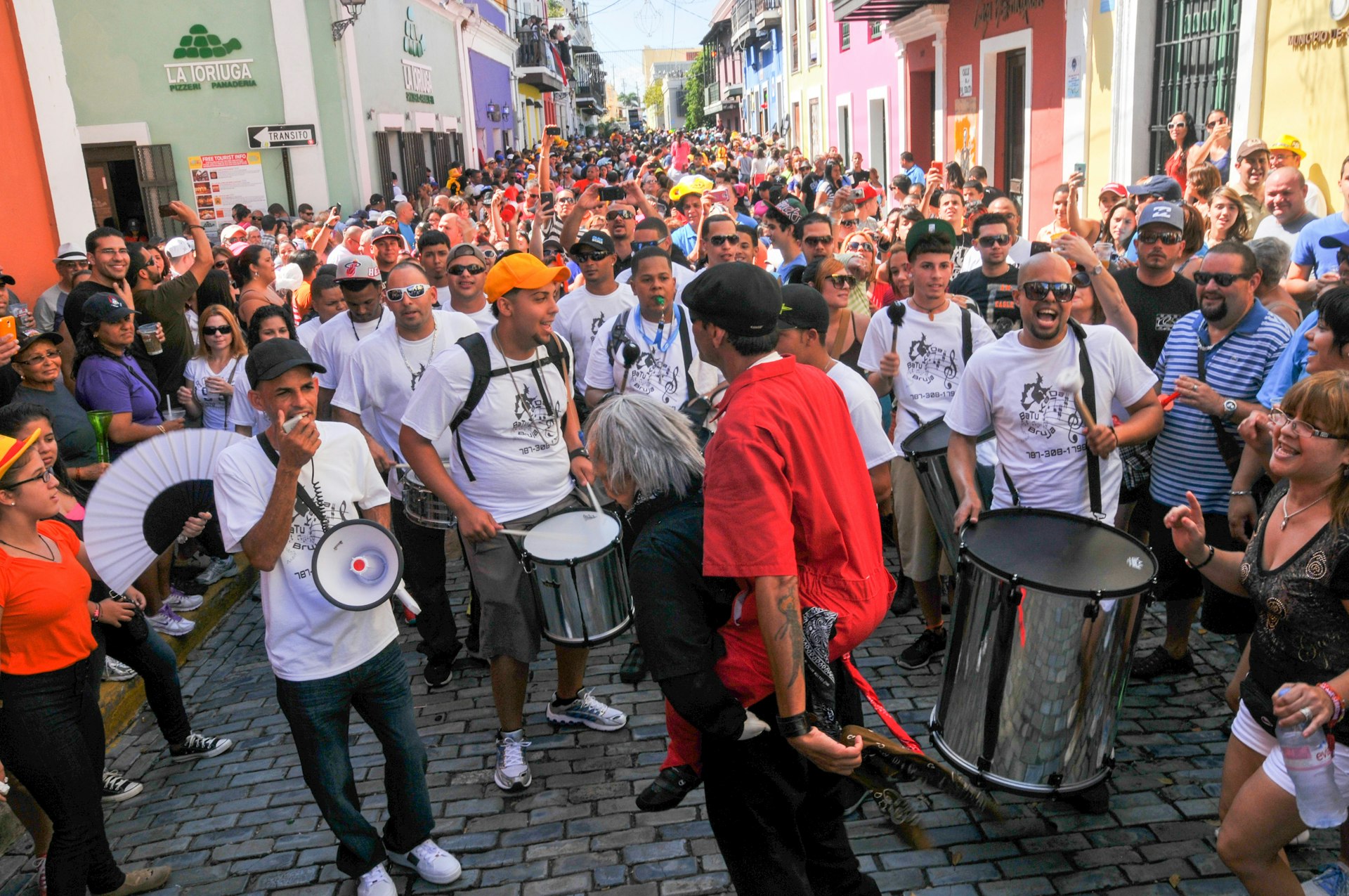 Revelers participate in the San Sebastián Festival, San Juan, Puerto Rico