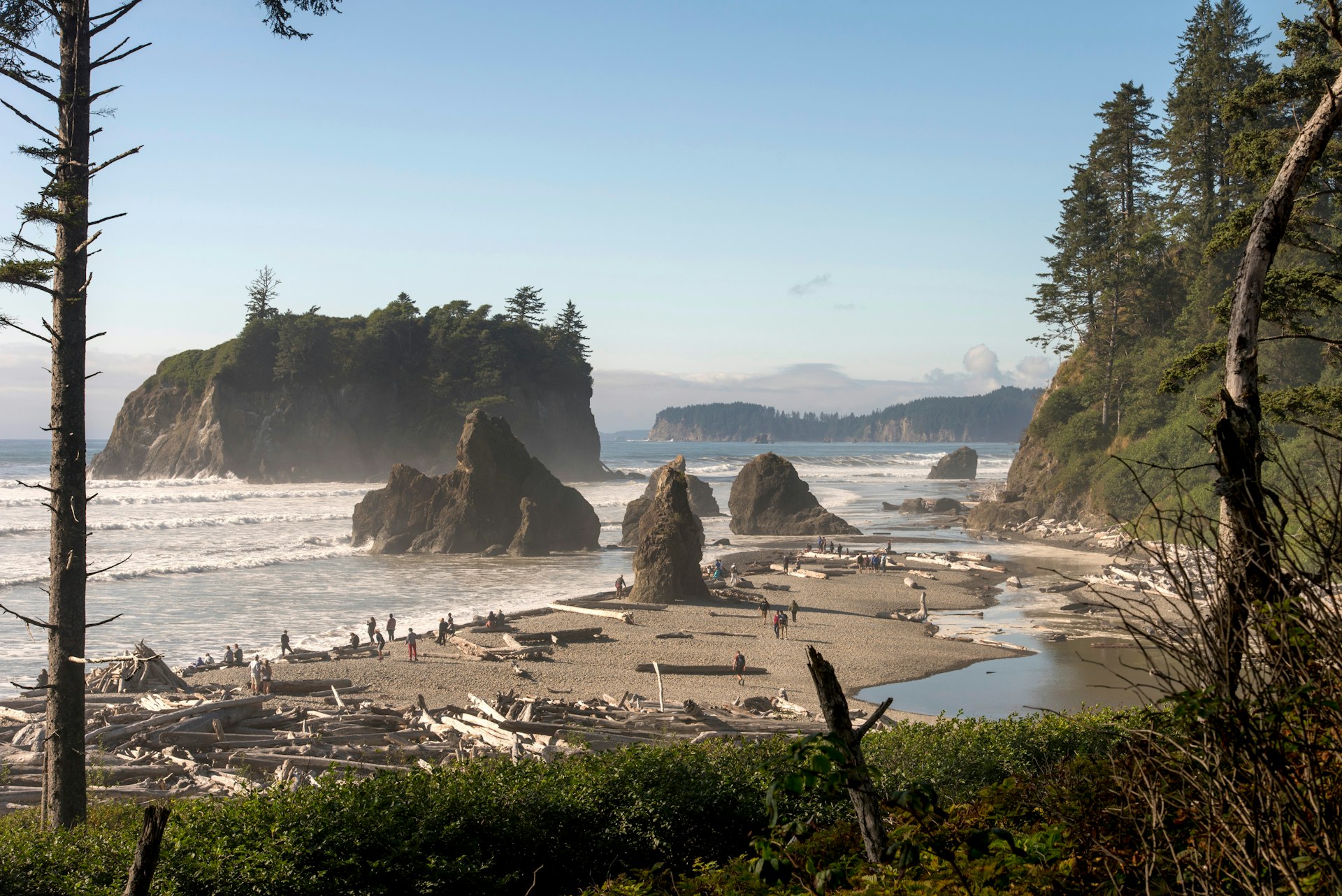 Tourists visit Ruby Beach in Olympic National Park, Washington State, USA