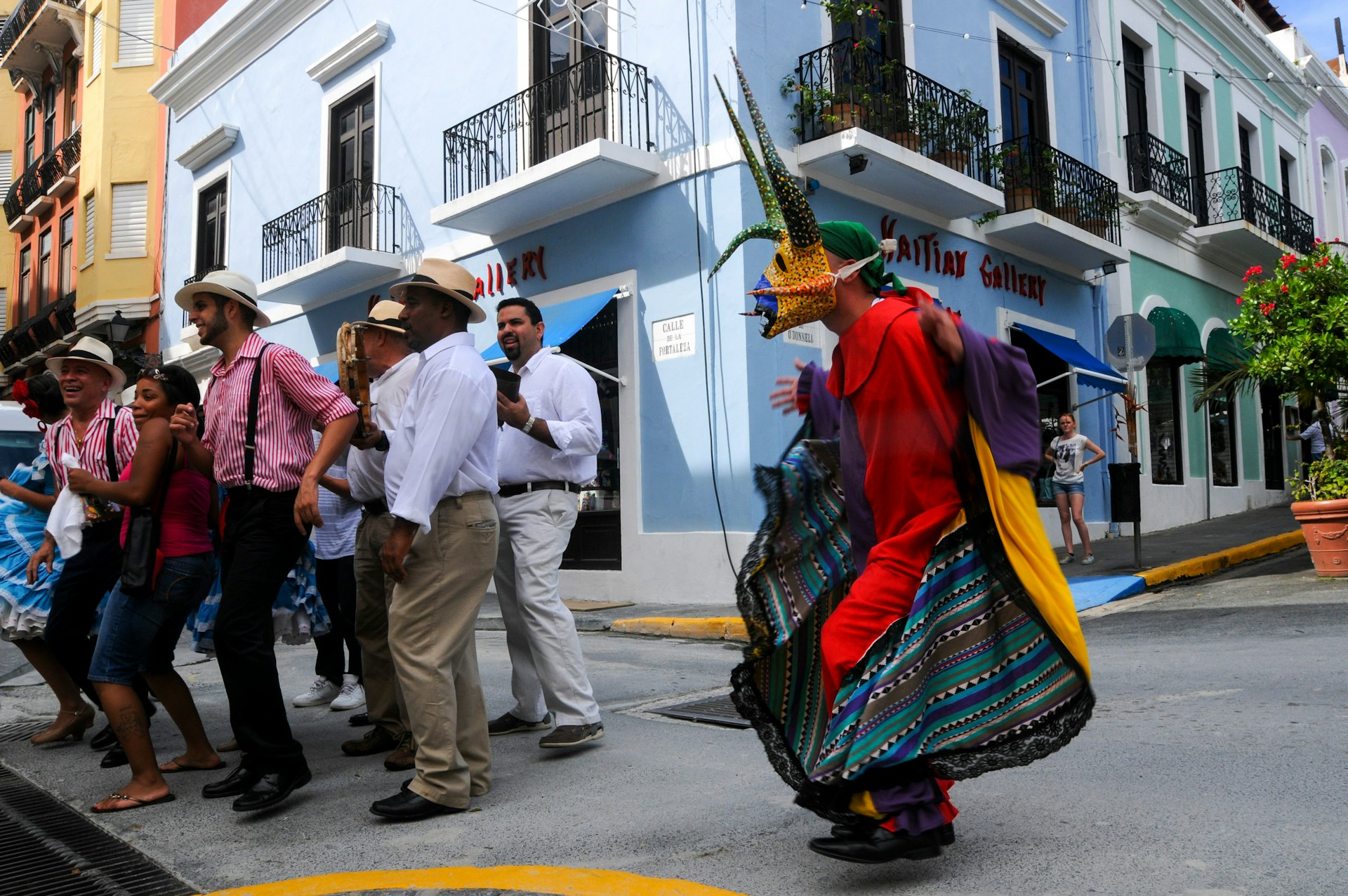 Traditional dancers celebrate on the streets of San Juan, Puerto Rico
