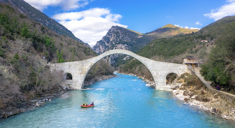 The great arched stone bridge of Plaka on Arachthos river, Tzoumerka, Greece.; Shutterstock ID 2131287987; full: 65050; gl: Lonely Planet Online Editorial; netsuite: Best places to visit in Greece; your: Brian Healy
2131287987
aerial, ancient, arachthos, arahthos, arch, arched, architecture, bridge, canyon, cascade, drone, environment, epiros, epirus, famous, forest, greece, greek, historic, historical, history, ioannina, landscape, medieval, monument, mountain, natural, nature, old, park, pindos, pindus, plaka, rafting, river, rock, scenery, scenic, stone, stream, structure, traditional, travel, tree, tzoumerka, vacation, water, waterfall, wild