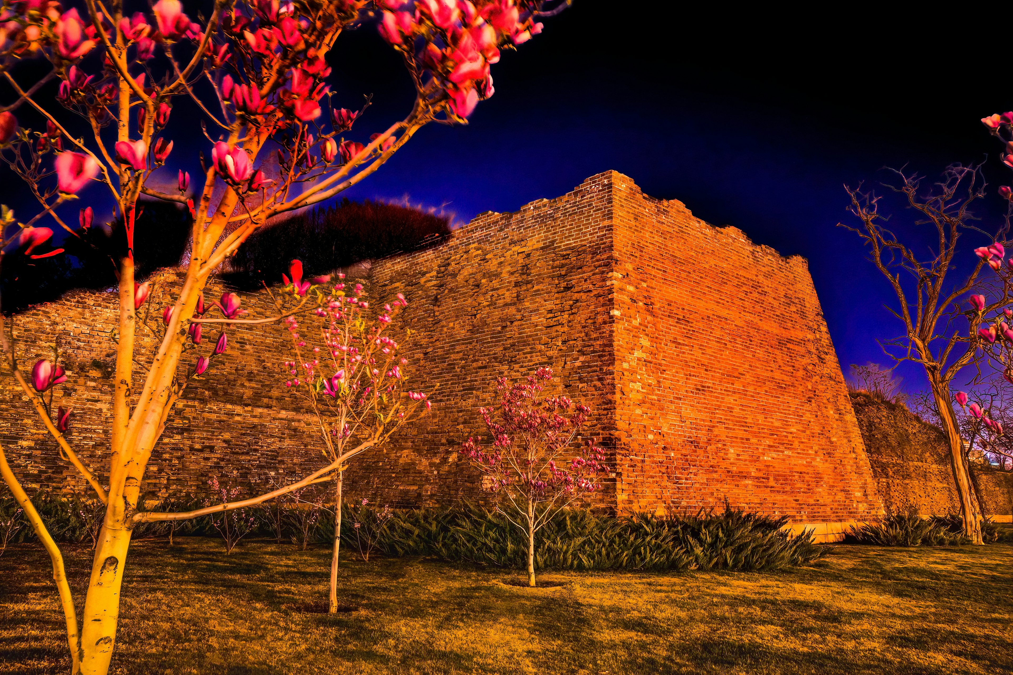 Ruins of the old wall illuminated at night, Ming City Wall Ruins Park, Beijing, China