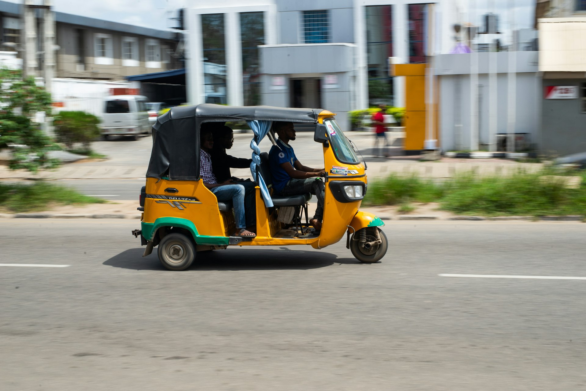 A keke (three-wheeled taxi) on a street in Lagos, Nigeria