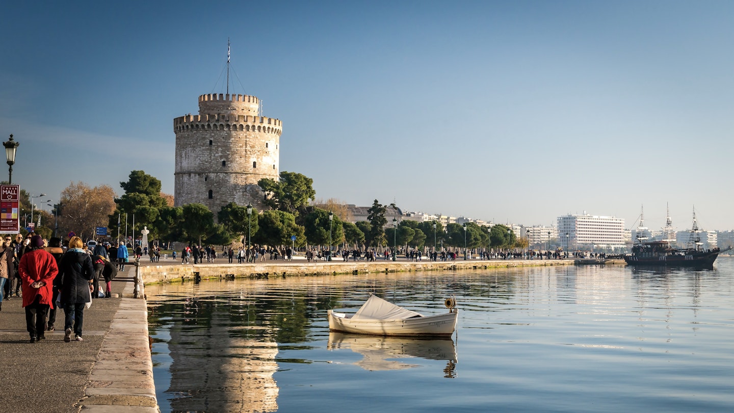 Thessaloniki, Greece - December 24, 2015: People walking on the coast in Thessaloniki next to the white tower which which once guarded the eastern end of the city's sea walls
358235459
castle,city,harbor,tourism,monument,selanik,building,sea,thessalonica,thessaloniki,venetian,view,makedonia,walls,greece,salonica,saloniki,white,thessalonika,landmark,salonika,europe,tower,greek,sightseeing,historic,middle,balkans,center,medieval,shore,macedonia,history,ancient,boat,touristic,calm,coast,fortress,background,ruins,sunset,waterfront,fort,fortification,landscape,byzantine