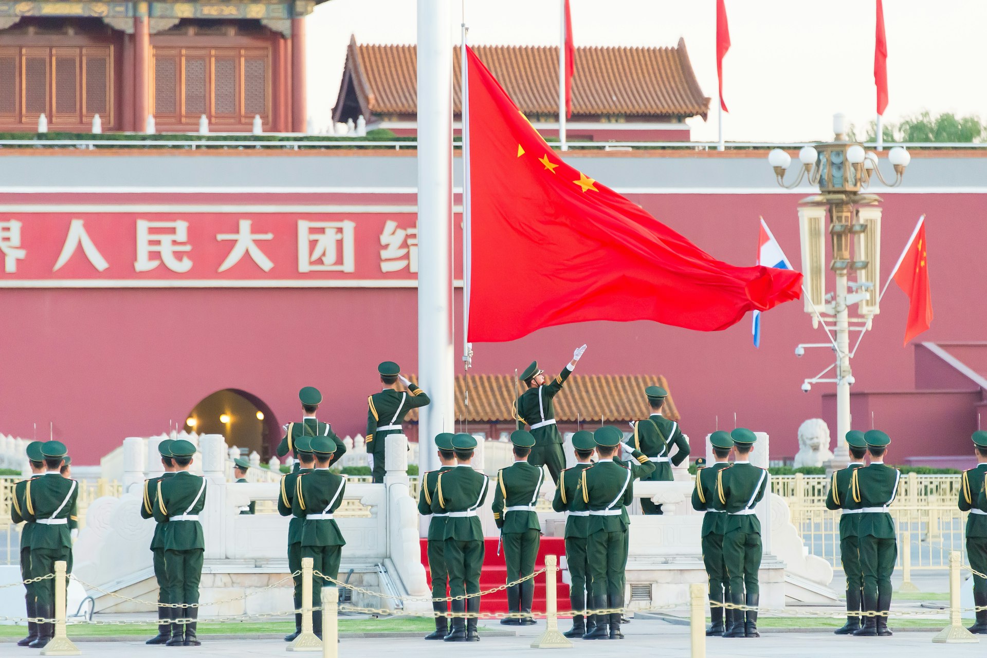 Troops raise the Chinese flag in Tian’anmen Square, Beijing, China