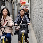 Beijing,China-April 2017-two young girls riding bike-shared bikes visiting hutong in beijing.; Shutterstock ID 624689186; full: 65050; gl: Lonely Planet Online Editorial; netsuite: Free things in Beijing; your: Brian Healy
624689186
beijing, bicycle, bike-shared, china, chinese, girl, holiday, hutong, ofo, ra de, riding, share, sm ill, spring, stick, street, visit, wall, yellow, young
