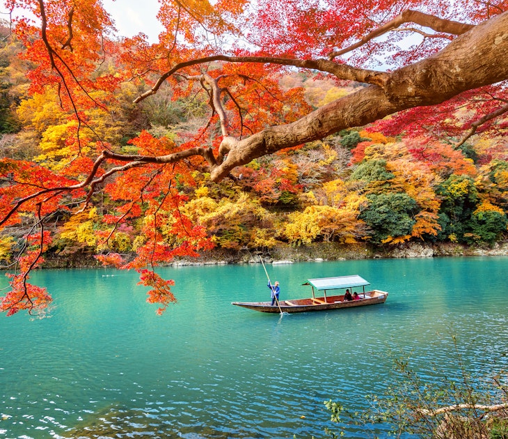 Boatman punting the boat at river. Arashiyama in autumn season along the river in Kyoto, Japan.; Shutterstock ID 769274452; purchase_order: Online Editorial; job: 65050; client: Bailey Freeman; other: Best things to do Kyoto
769274452
