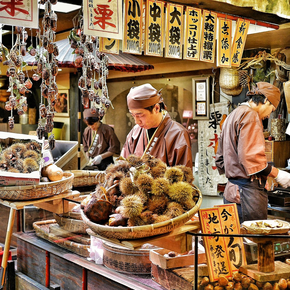 Vendors prepare chestnuts to sell at Nishiki Market in Kyoto, Japan on 22 November 2016.
1011566827
traditional, street, asian, nutrition, priest, tourism, fruit, editorial, cooking, design, east, tradition, chinese, famous, stall, recommend, sale, asia, vendor, nut, cuisine, chef, color, people, culture, food, castanea, healthy, place, chestnut, travel, vegetable, market, business, tourist, architecture, marron, buy, furniture, decoration, colorful, merchant, city, nishiki market, japan, street food, japanese, sell, kyoto, shop