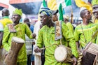 August 23, 2018: Drummers dressed in traditional Yoruba attire perform at the Ojude Oba Festival.
1163097595
africa, beautiful, celebration, color, costume, culture, destination, drummer, green, group, heritage, history, ijebu, lifestyle, local, nigeria, ogun, outdoor, people, photojournalism, street, tourism, town, tradition, traditional, travel, yoruba