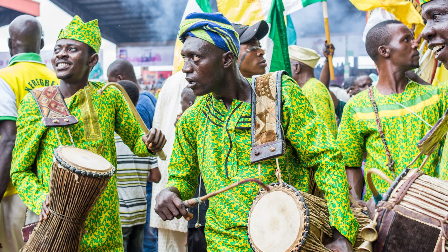 August 23, 2018: Drummers dressed in traditional Yoruba attire perform at the Ojude Oba Festival.
1163097595
africa, beautiful, celebration, color, costume, culture, destination, drummer, green, group, heritage, history, ijebu, lifestyle, local, nigeria, ogun, outdoor, people, photojournalism, street, tourism, town, tradition, traditional, travel, yoruba
