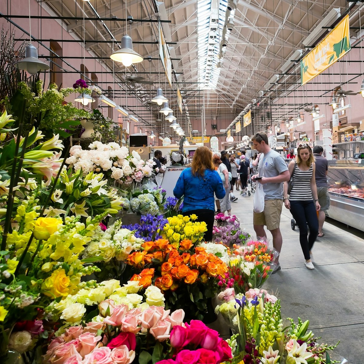 WASHINGTON DC-May 24, 2015: Inside the historic Eastern Market in the Capitol Hill neighborhood, first opened in 1805. Image of shoppers browsing. Colourful flower stand in the foreground.
aisle, america, american, architecture, attraction, building, buyers, capitol, columbia, dc, destination, district, eastern, exterior, farmers, flowers, food, historic, inside, interior, landmark, market, marketing, marketplace, men, neighborhood, old, people, public, residents, sellers, shopper, shopping, stalls, states, structure, tourism, tourist, united, us, usa, vintage, visitors, walking, washington, weekend, women