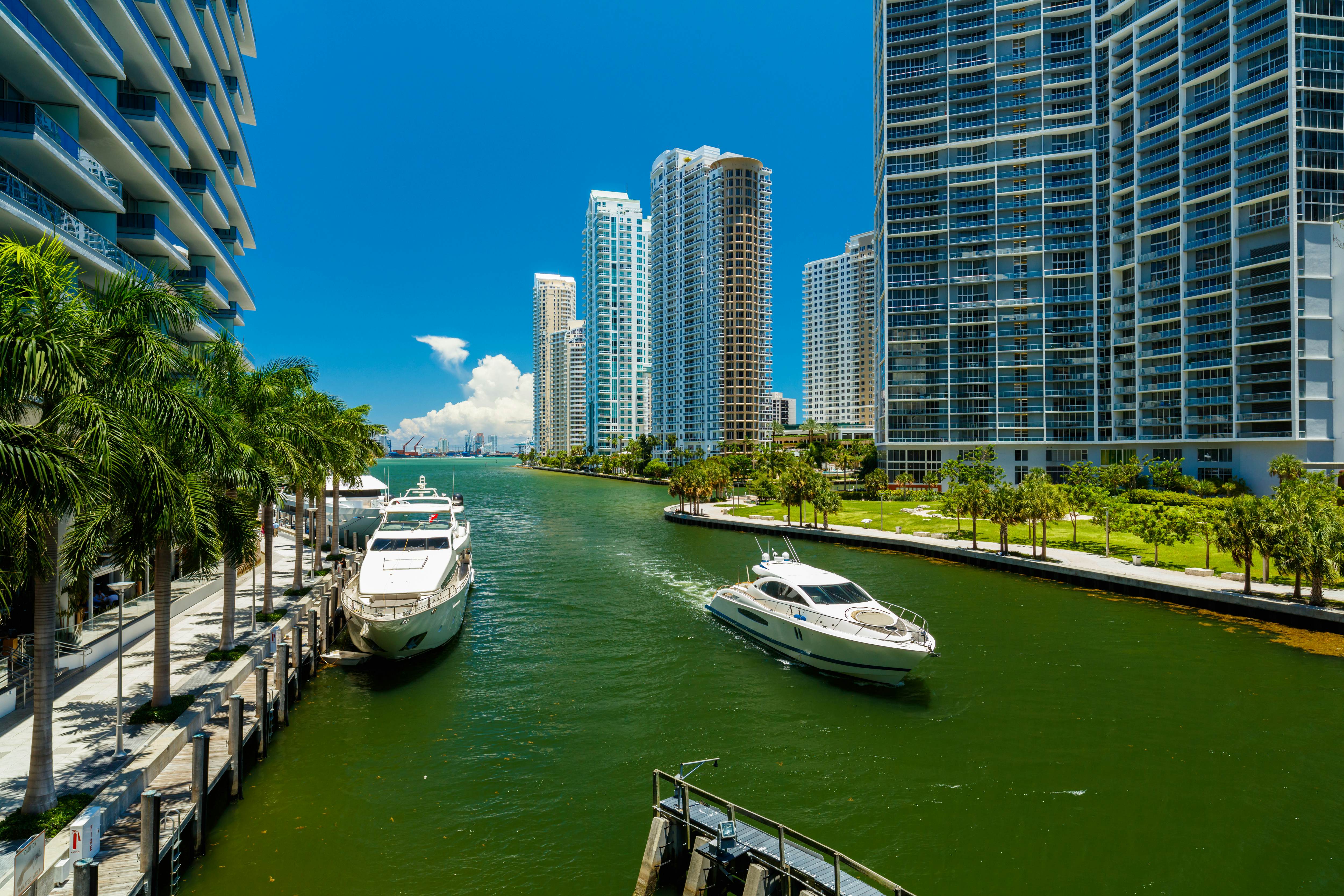 Downtown Miami along the Miami River inlet with Brickell Key in the background and yacht cruising by.
289314128
outdoor, downtown, skyscraper, metropolitan, usa, river, day, urban, condominium, sunny, luxury, skyline, yacht, condo, building, miami, modern, dock, metropolis, boating, lifestyle, architecture, city, colorful, beauty, boat, beautiful, water, nature, pretty, florida, vacation, inlet, landscape, cityscape, riverwalk, destination, shore, key, travel, brickell, united, states, blue, sky, bay, side