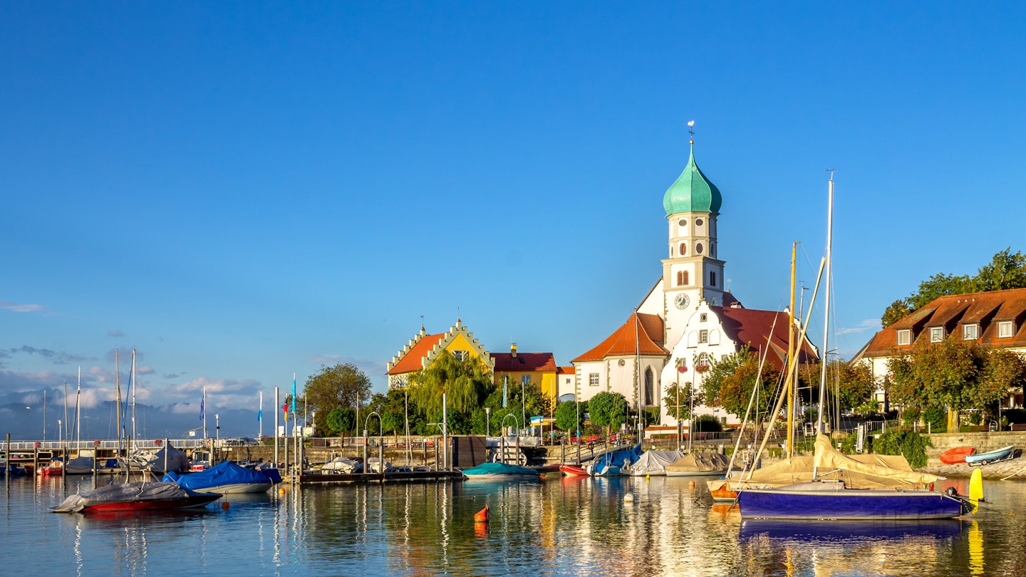 Harbour with the Church of Saint George, Wasserburg, Lake of Constance.
525797080
aerial, architecture, attraction, background, bavaria, bodensee, building, castle, church, city, clearance, constance, daylight, destination, excursion, experience, famous, famously, georg, germany, health, holiday, holidays, interest, lake, landmark, monument, nobody, of, on, peninsula, place, resort, rest, saint, seeing, south, swabia, text, the, tourism, touristically, travel, vacation, wasserburg, water, way, worth