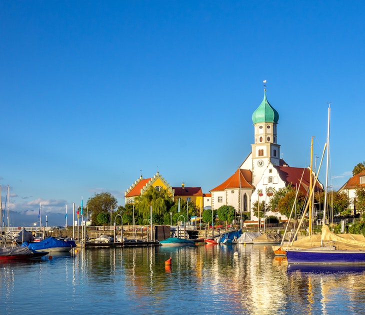 Harbour with the Church of Saint George, Wasserburg, Lake of Constance.
525797080
aerial, architecture, attraction, background, bavaria, bodensee, building, castle, church, city, clearance, constance, daylight, destination, excursion, experience, famous, famously, georg, germany, health, holiday, holidays, interest, lake, landmark, monument, nobody, of, on, peninsula, place, resort, rest, saint, seeing, south, swabia, text, the, tourism, touristically, travel, vacation, wasserburg, water, way, worth