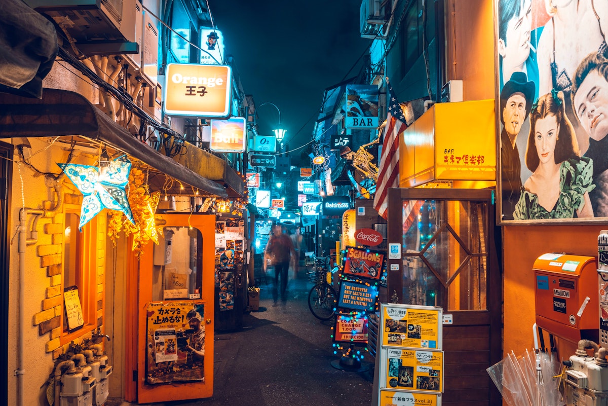 Shinjuku, Tokyo, Kanto region, Japan. Tiny alleys crowded with night bars and clubs at Golden Gai district.