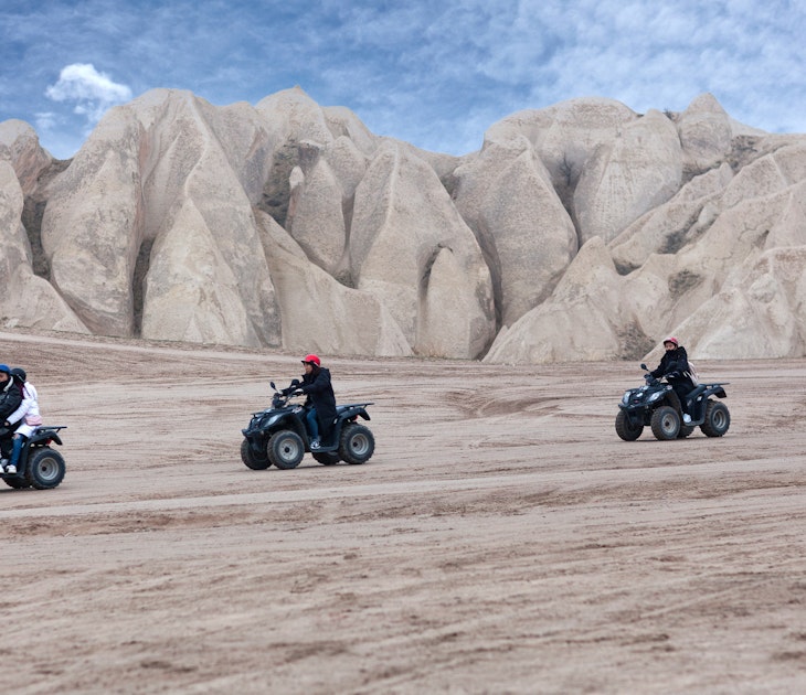 Goreme, Turkey - January 8, 2018: Group of happy tourists enjoying a quad bike ride on the mountains road in countryside over Red Valley in Cappadocia, Central Anatolia. Nevsehir, Goreme National Park
1302131869