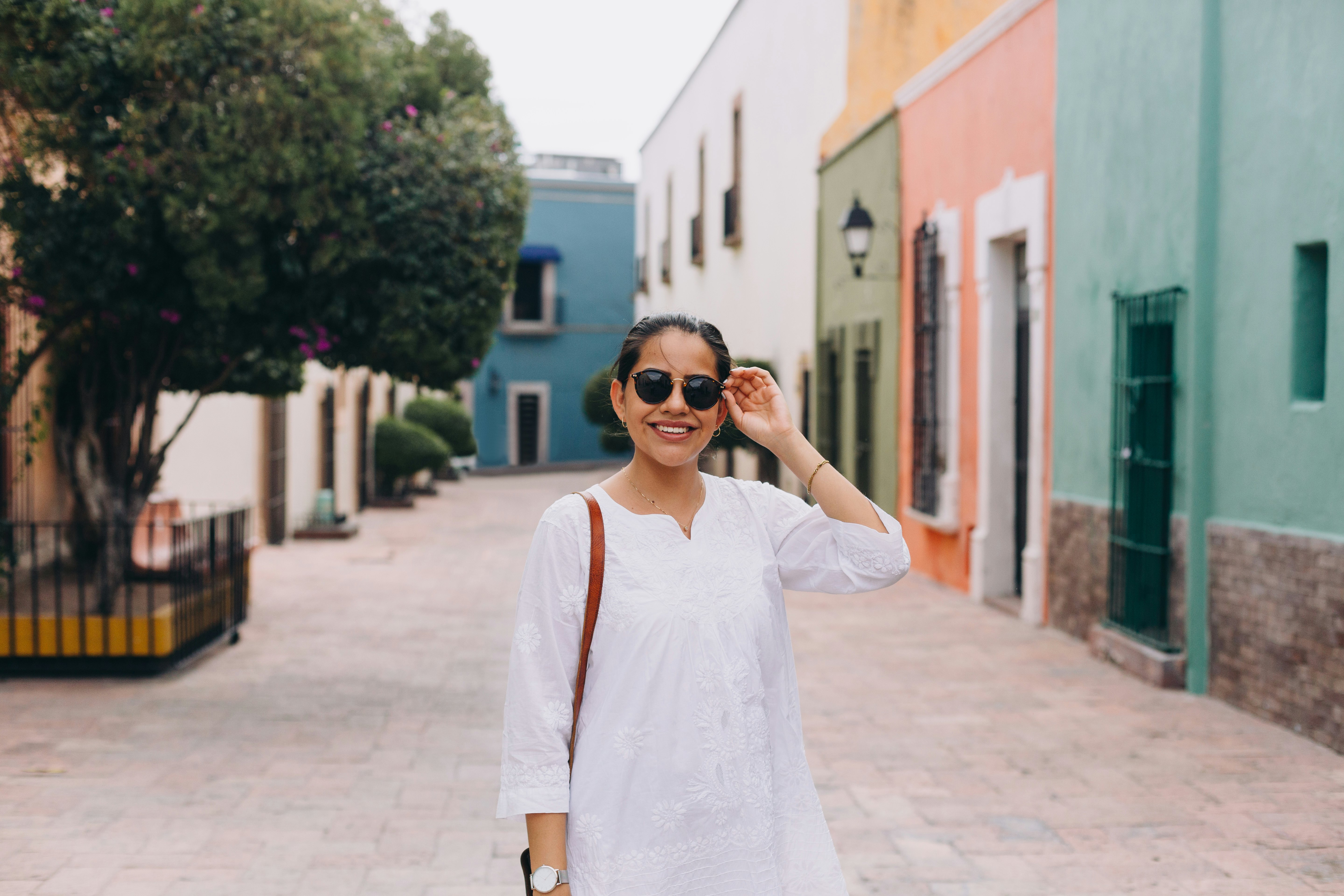 One young woman on a leisurely walk through the city center of Queretaro