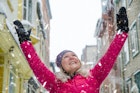 Mature woman enjoying snow in an alley during a winter day in Quebec city
1384898571