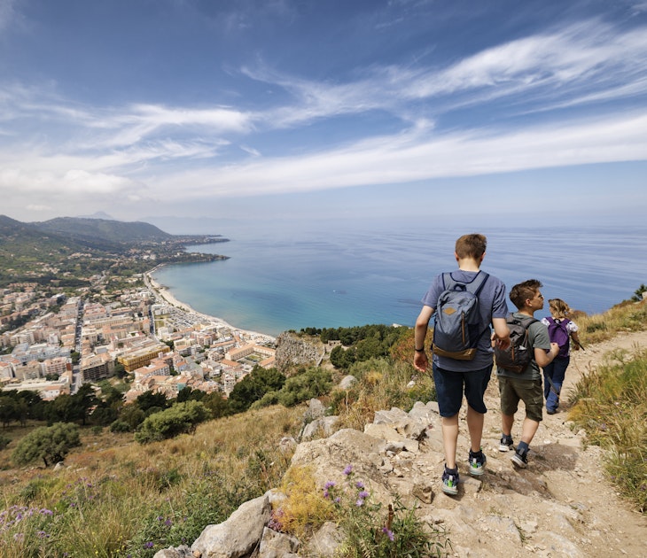 Mother and two teenage sons are hiking in Sicily, Italy. They are hiking on the hill near the town of Cefalu. Sunny spring day...Canon R5
1399004882