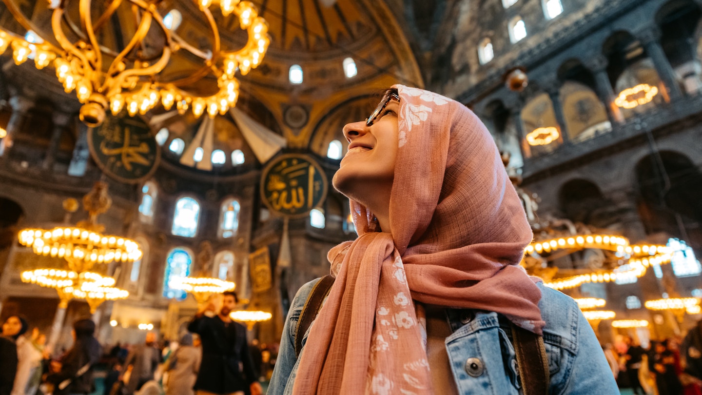 Young woman enjoying a view inside of Hagia Sofia in Istanbul, Turkey.
1496877705